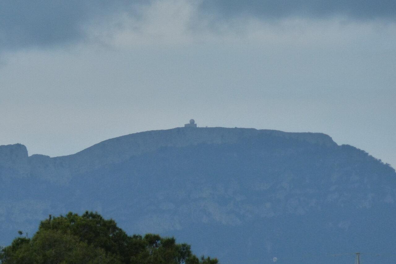 La Miranda ridge and its weather radar partly obscured by low cloud